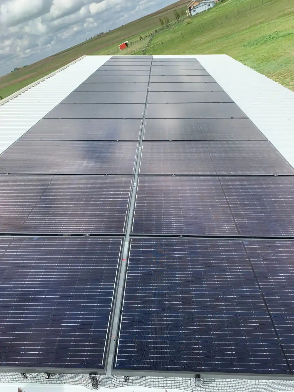 Clean energy solar panels reflecting sunlight in Erie