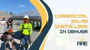 Commercial solar installation crew on a rooftop worksite in Denver