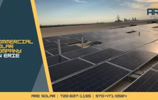 Commercial solar installation with rows of panels on an Erie rooftop