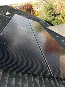 High-efficiency rooftop solar panels on a Larkspur, CO home, showcasing clean energy and modern residential installation