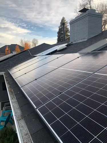 Solar panel system reflecting sunlight after professional maintenance