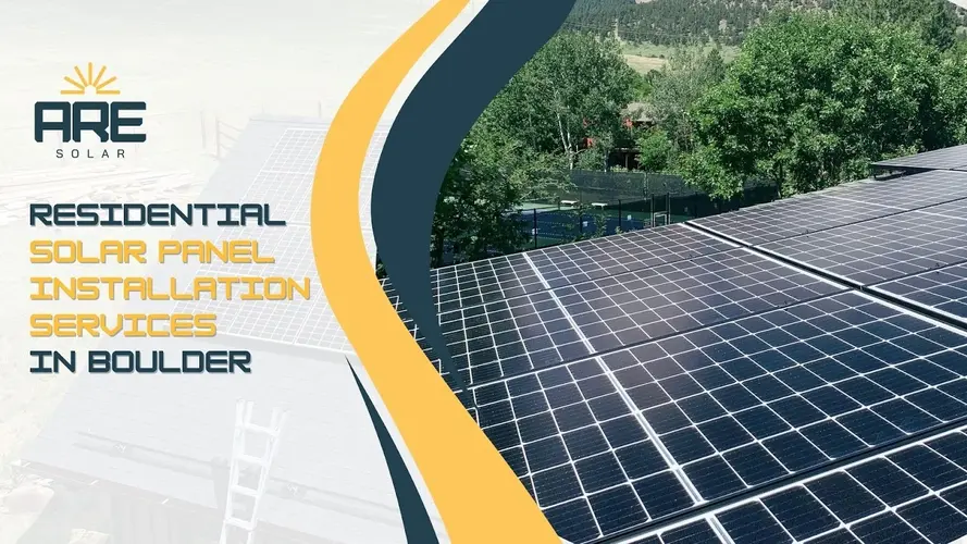 Solar panels on a Boulder rooftop surrounded by greenery, capturing peak summer sunlight